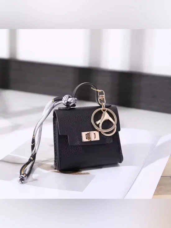 Black Mini Bag Charm Accessory with Gold Hardware and Scarf Accent - Picture 1 of 5